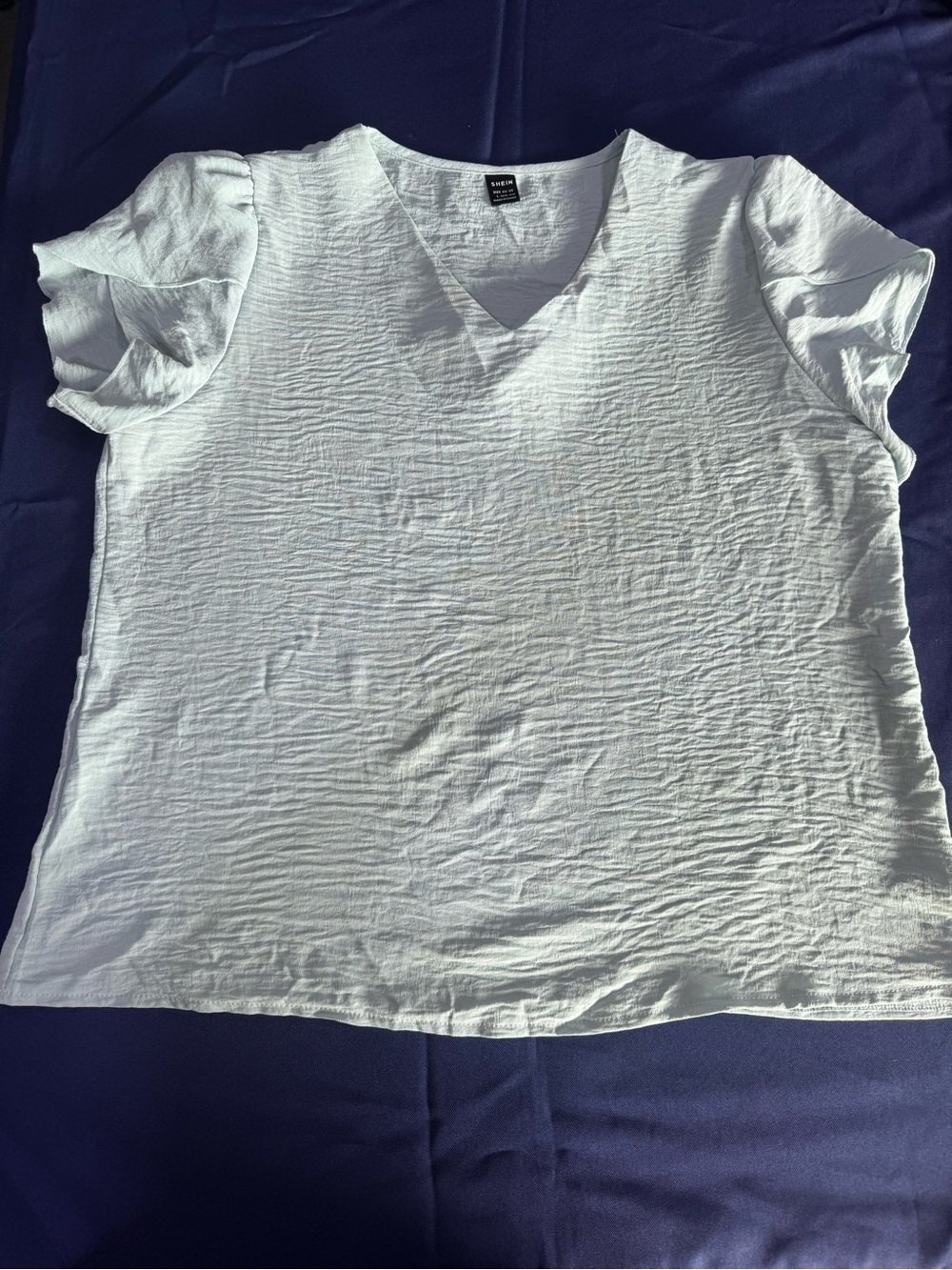 Women's light blue V-Neck Ruffle Sleeve Top